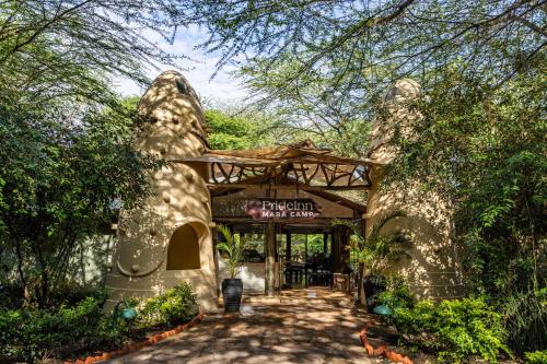 a entrance to a disney animal kingdom restaurant at PrideInn Mara Camp & Cottages in Talek