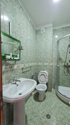 Koupelna v ubytování Heming-way Hotel