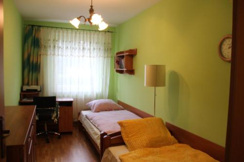 Postel nebo postele na pokoji v ubytování Apartament Jawornik