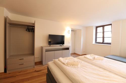 Postel nebo postele na pokoji v ubytování Das Fischer Boardinghouse KF