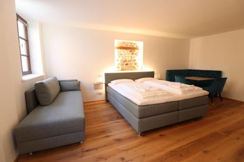 Postel nebo postele na pokoji v ubytování Das Fischer Boardinghouse KF