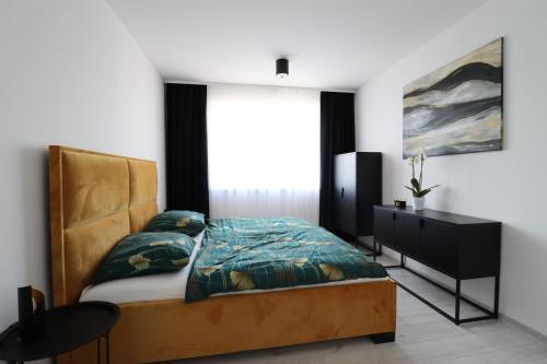 A bed or beds in a room at MBV28 Apartments