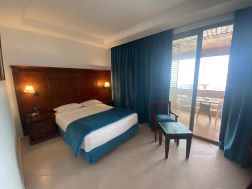 Una cama o camas en una habitación de Hotel Azur