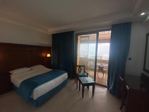 Una cama o camas en una habitación de Hotel Azur