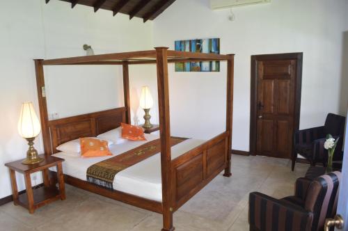 Ένα ή περισσότερα κρεβάτια σε δωμάτιο στο Villa Tee Four