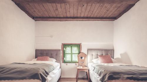 Postel nebo postele na pokoji v ubytování Apartamenty EverySky Janice