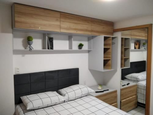 En eller flere senge i et værelse på Apartamento em Nova Betânia - West Flat Mossoró