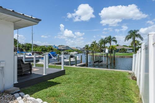 a view of a marina from a house at Updated Waterfront Condo in Apollo Beach in Apollo Beach