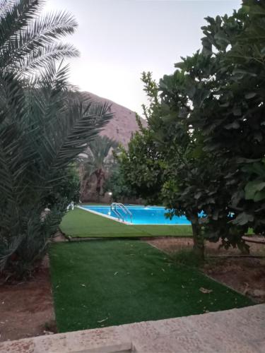 Bazén v ubytovaní Rimal Villas فلل الرمال alebo v jeho blízkosti