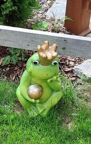 a statue of a frog with a crown on its head at Ferienwohnung Widmann in Jochberg