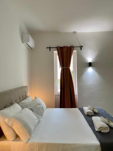 Ένα ή περισσότερα κρεβάτια σε δωμάτιο στο Habitat Luxury Suites