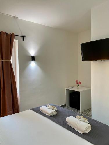 Ένα ή περισσότερα κρεβάτια σε δωμάτιο στο Habitat Luxury Suites