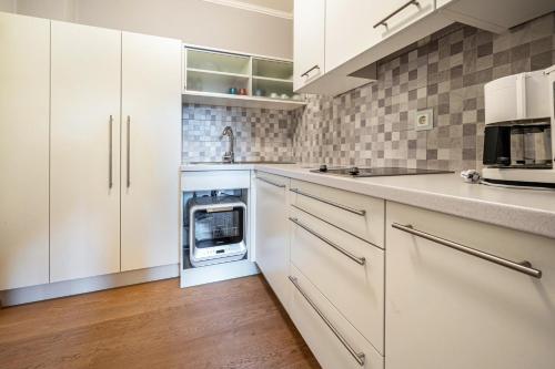 Kuchyň nebo kuchyňský kout v ubytování Alpen Living 1 Stock klein