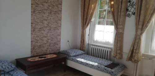Postel nebo postele na pokoji v ubytování Willa Dunajec