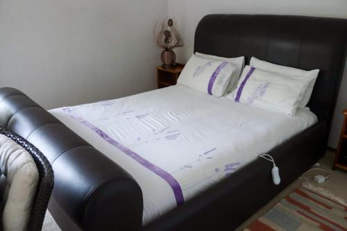 Кровать или кровати в номере Bougainvillea at Boskruin