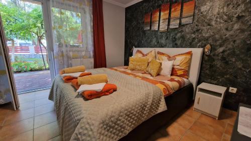 Ένα ή περισσότερα κρεβάτια σε δωμάτιο στο Veronika Villa