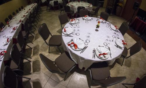 a large white table with chairs in a room at Best Western Hotel Class Lamezia in Lamezia Terme