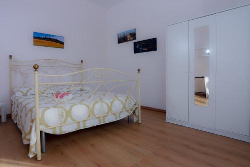 Letto o letti in una camera di Casa Sophie Affittacamere