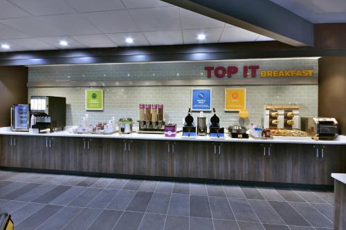 a top it breakfast counter in a restaurant at Tru By Hilton Beckley, Wv in Beckley