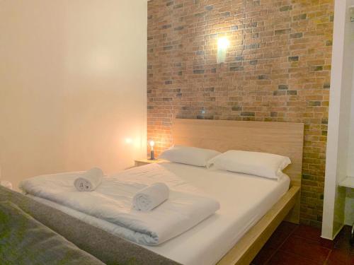 Postel nebo postele na pokoji v ubytování Studio Apartment - Tv da Madalena 05
