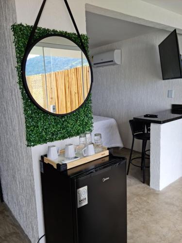 Η κουζίνα ή μικρή κουζίνα στο Alto da Piraquara Flat