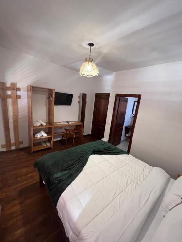 Cama o camas de una habitación en Nëna Dashuri Agroturizëm