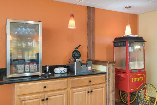 a kitchen with a counter with a food cart at Best Western Inn in Goshen
