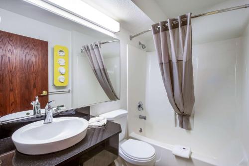 a bathroom with a sink and a toilet and a shower at Motel 6-Dixon, CA in Dixon