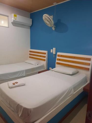 Postel nebo postele na pokoji v ubytování HOTEL MAR DEL CARIBE