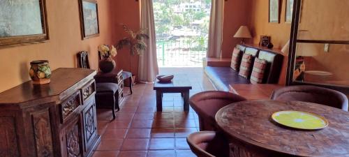 Posezení v ubytování Deluxe Cat Condo