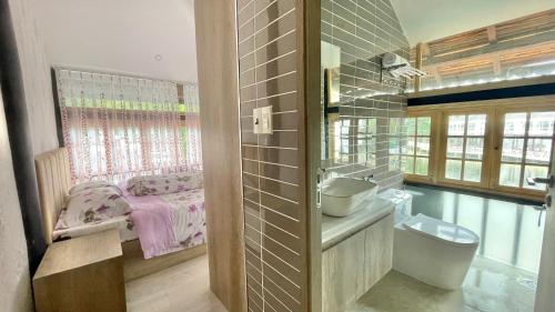 Ένα μπάνιο στο Biệt thự hồ bơi 6pn Nguyễn Hiền - Đi bộ ra biển Bãi Sau - Vũng Tàu