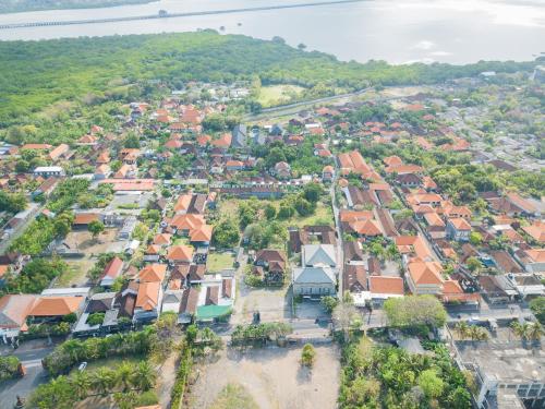 an aerial view of a town with houses at Green D'mel Bali in Nusa Dua