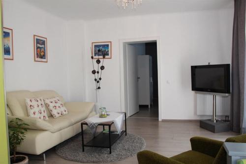 TV a/nebo společenská místnost v ubytování Ferienwohnung Grete