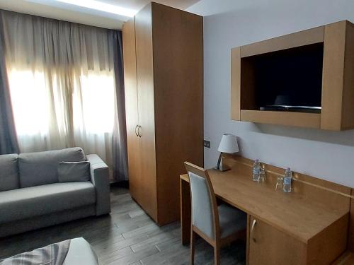 TV a/nebo společenská místnost v ubytování El Ghanami Hotel