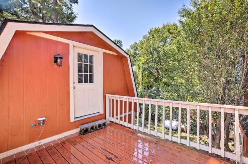 a porch of a house with a white door at Sunny Willis Escape with Deck and Lake Access! in Willis