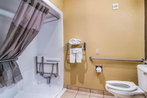 a bathroom with a toilet and a shower at Motel 6-Canton, GA in Canton