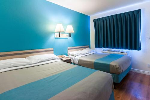 Ένα ή περισσότερα κρεβάτια σε δωμάτιο στο Motel 6-Green River, UT