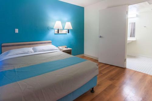 Ένα ή περισσότερα κρεβάτια σε δωμάτιο στο Motel 6-Green River, UT