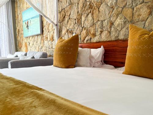 A bed or beds in a room at Bahia Mar Boutique Hotel