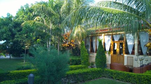 Jardín al aire libre en Malinamoc Paradise