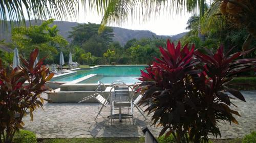 The swimming pool at or near Malinamoc Paradise