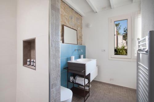 Kúpeľňa v ubytovaní AMORE RENTALS - Villa Ambretta
