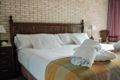 Roc Blanc Hotel & Spaにあるベッド