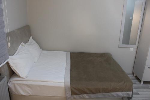 Katil atau katil-katil dalam bilik di KONAK HOTEL 2