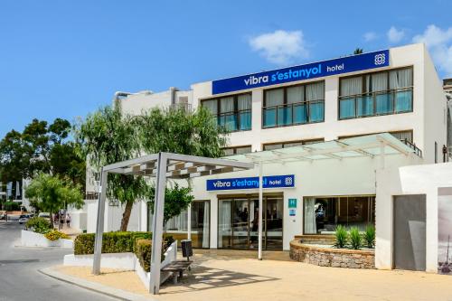 a building with a sign that reads what aquarium needs at Hotel Vibra s'Estanyol in San Antonio Bay
