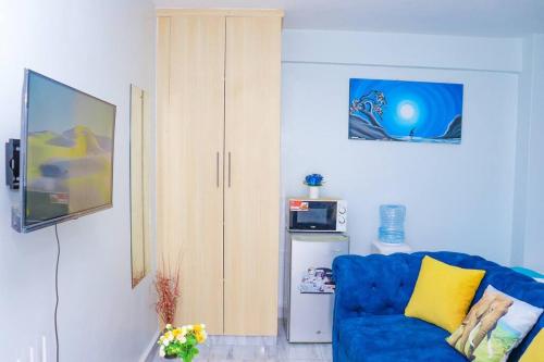 LaMeg Furnished Studio in Fedhaにあるキッチンまたは簡易キッチン
