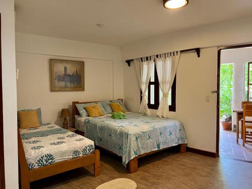 Ένα ή περισσότερα κρεβάτια σε δωμάτιο στο Wind Rider's Inn