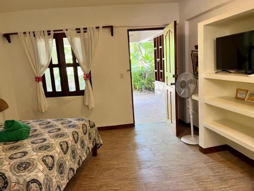 Ένα ή περισσότερα κρεβάτια σε δωμάτιο στο Wind Rider's Inn