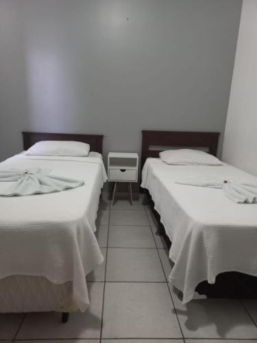 Katil atau katil-katil dalam bilik di Mindú Park Hotel