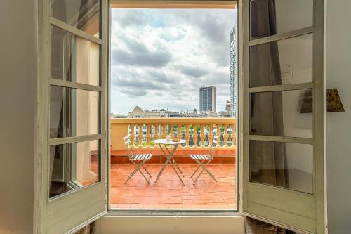 A balcony or terrace at Casa Gracia Apartments